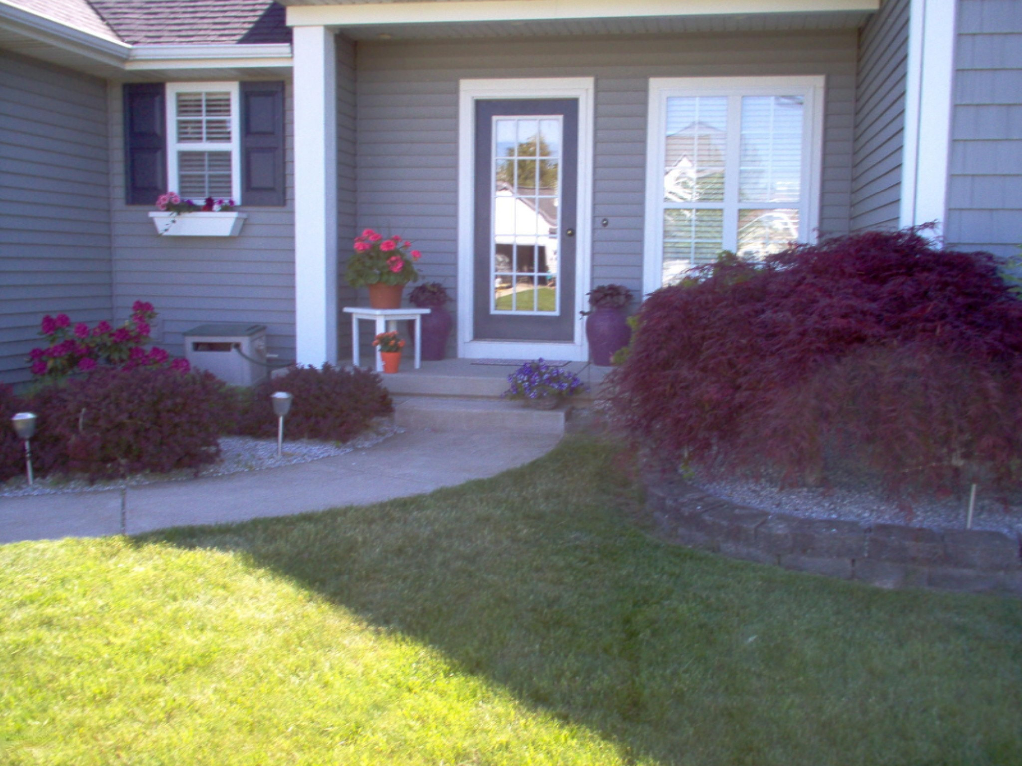 2045 Orchard Ridge Drive Northwest Walker, MI 49534 - Photo 3 of 25 Another front of home