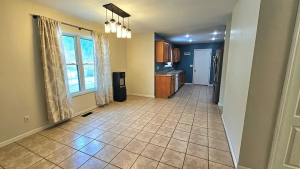 $298,000 | 10513 Loughrea Lane, Cement City, MI 49233