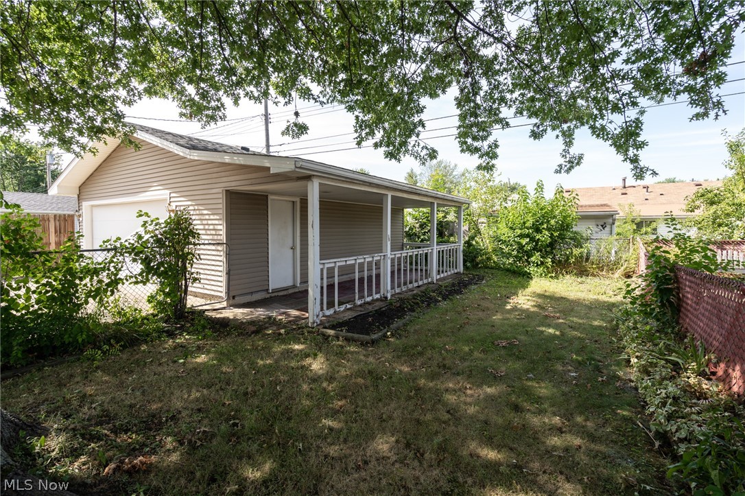 4145 Knickerbocker Road Sheffield Lake, OH 44054 - Photo 24 of 27 Backyard with patio off the garage
