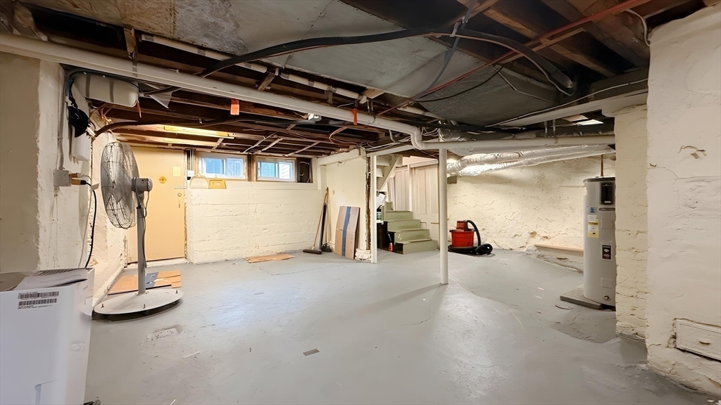 114 Curve Street Dedham, MA 02026 - Photo 22 of 27 a view of a room with wooden walls