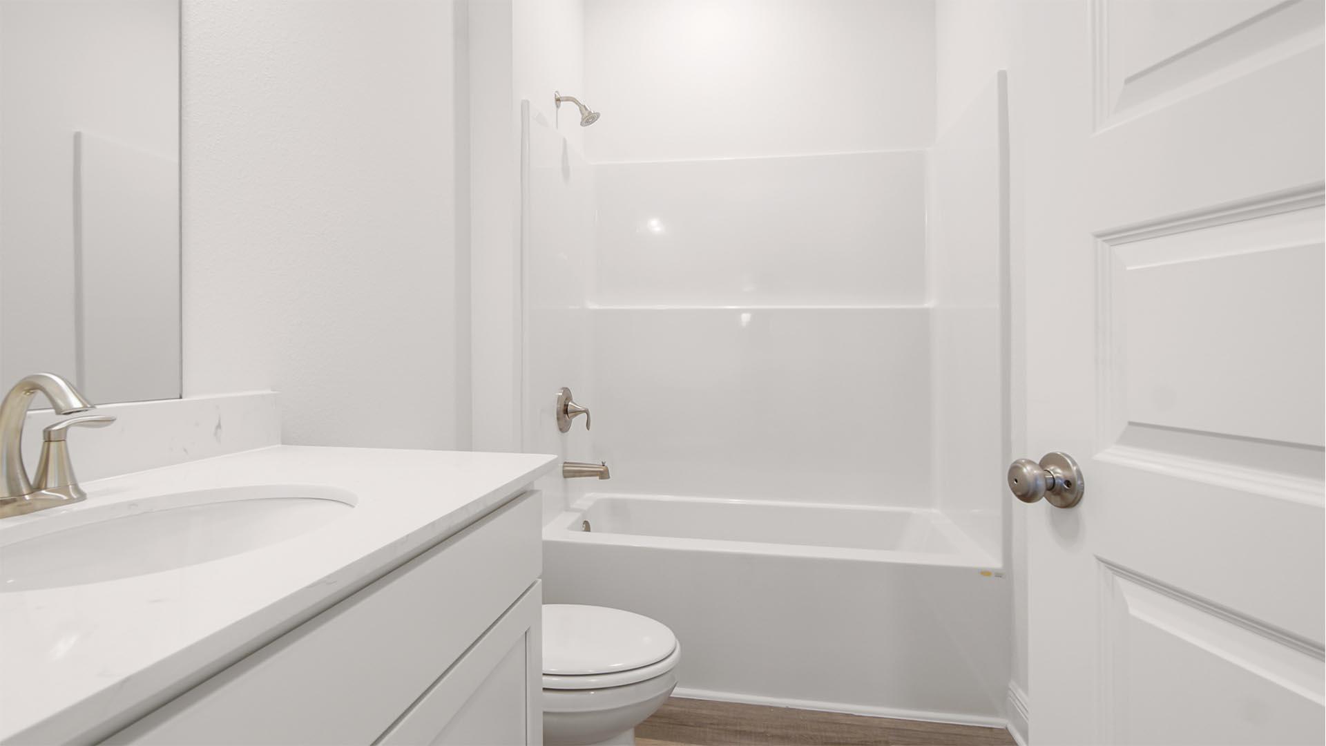 50 Foxtrail Run Freeport, FL 32439 - Photo 15 of 17 a bathroom with a sink a toilet and shower