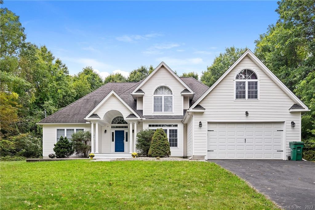187 Duncaster Road Bloomfield, CT 06002 - Photo 1 of 1 a front view of a house with a garden