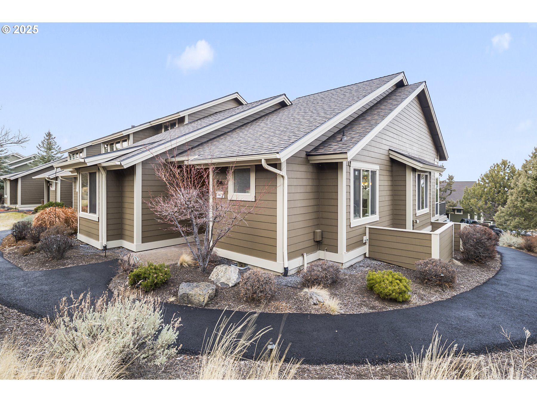 10879 Village Loop Redmond, OR 97756 - Photo 1 of 30 a house view with a outdoor space