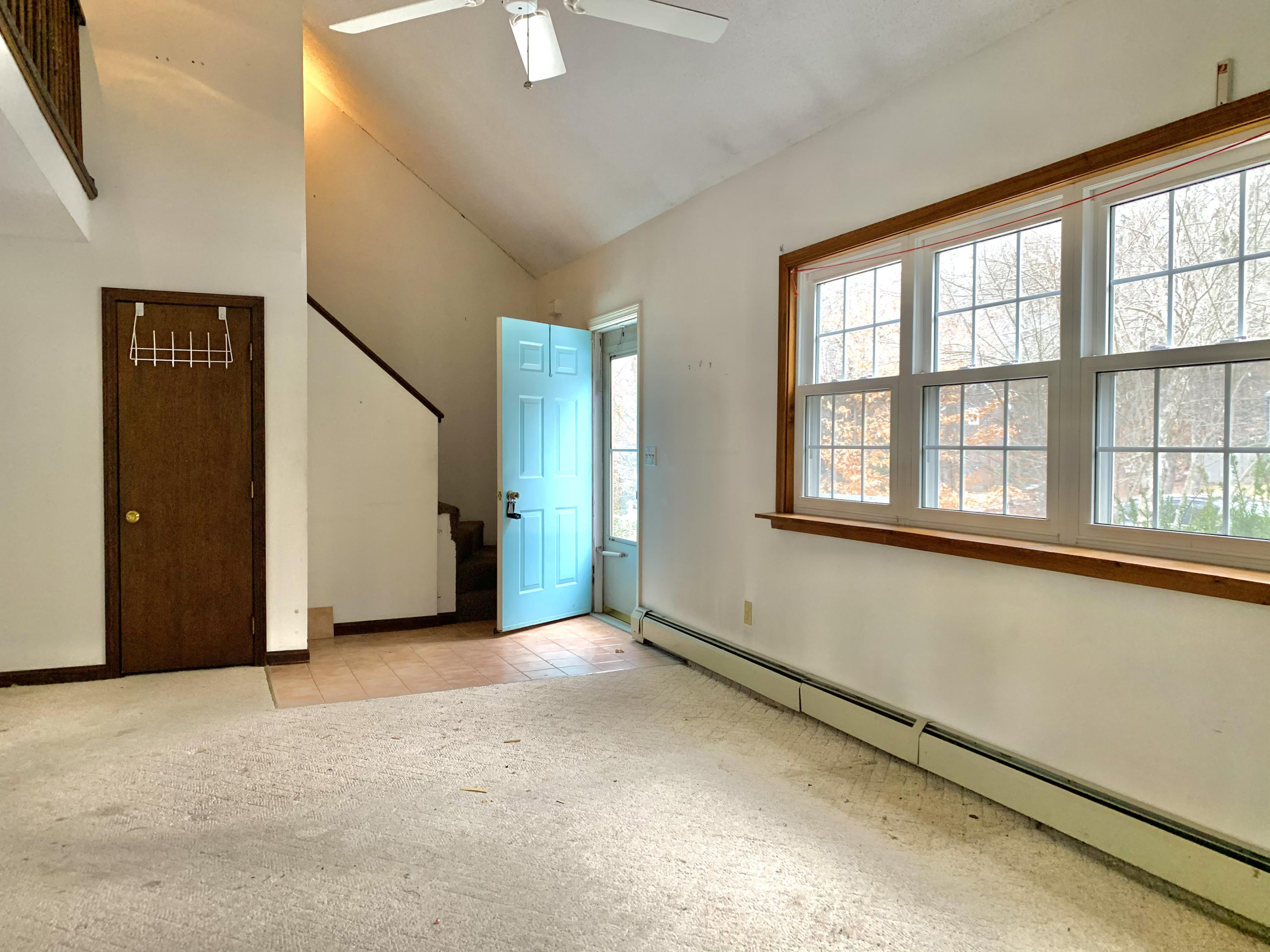 62 Deerfield Road Mashpee, MA 02649 - Photo 4 of 12 an empty room with a window