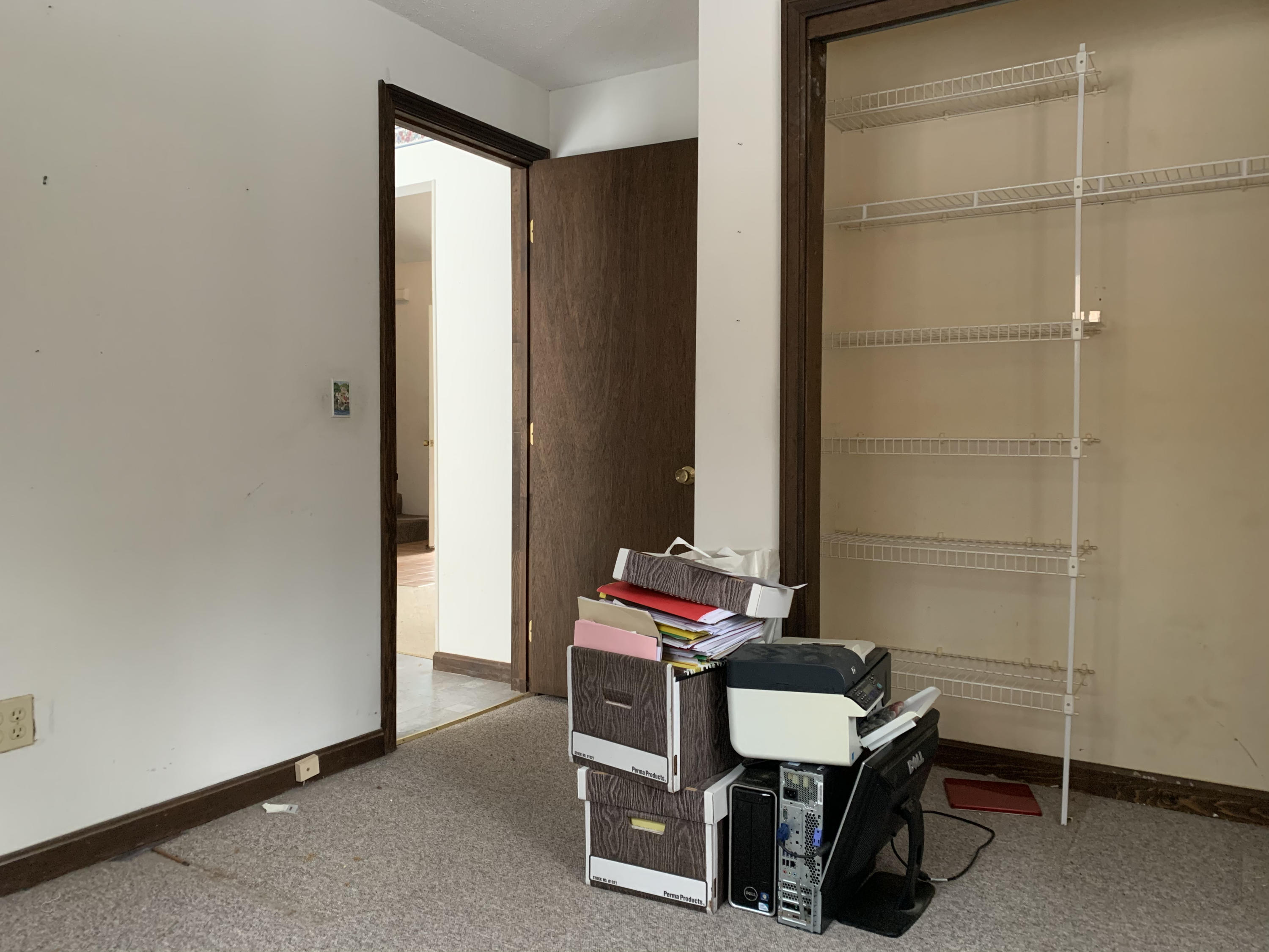 62 Deerfield Road Mashpee, MA 02649 - Photo 7 of 12 a room with a chair and a table
