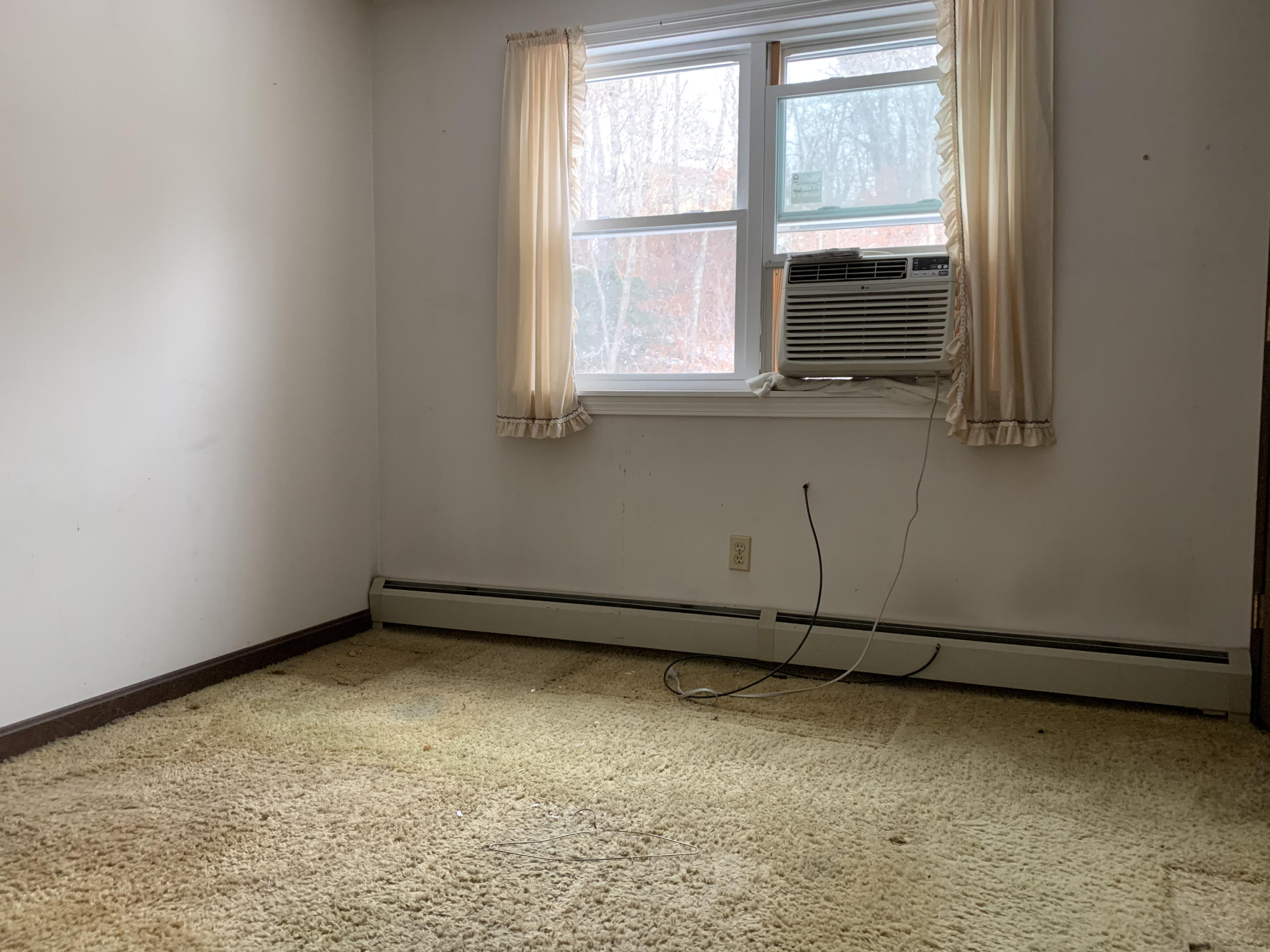 62 Deerfield Road Mashpee, MA 02649 - Photo 8 of 12 a view of a window in an empty room