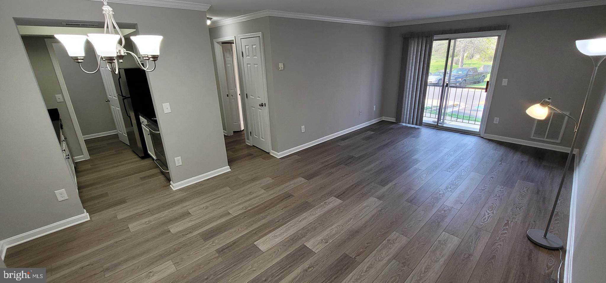 14905 Rydell Road, Unit 204 Centreville, VA 20121 - Photo 2 of 18 Dining/Living Room.2 - view from the front door