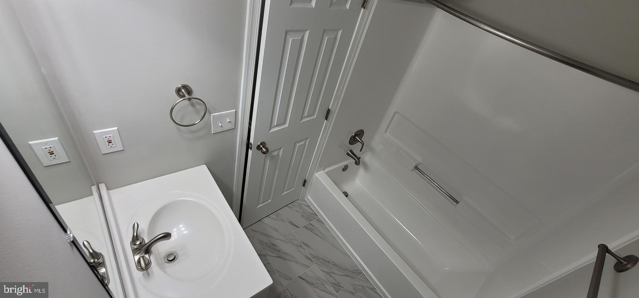 14905 Rydell Road, Unit 204 Centreville, VA 20121 - Photo 11 of 18 Bathroom - Refinished Bath, New Tile Flooring