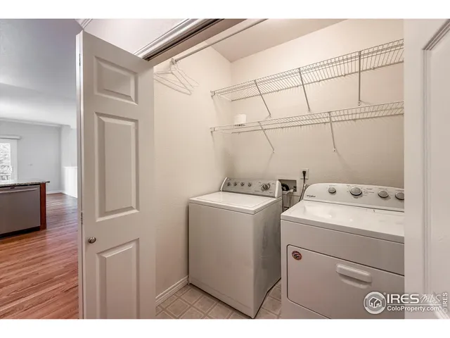a bathroom with a granite countertop sink a mirror a shower and a bathtub