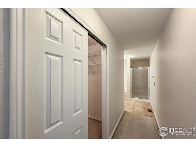 a view of a room with wooden walls