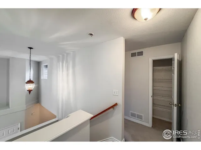 a view of a city with a building in the background