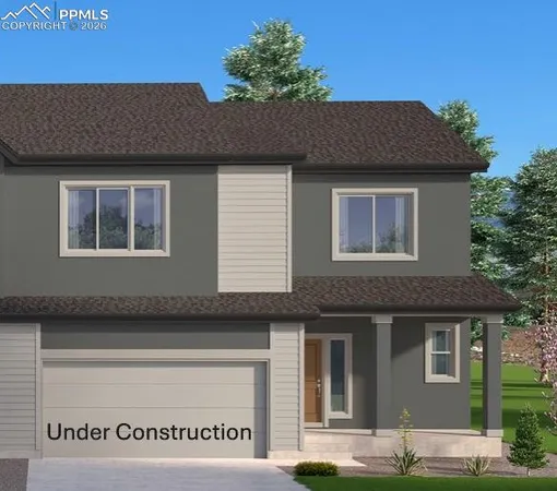 a front view of a house with a garage