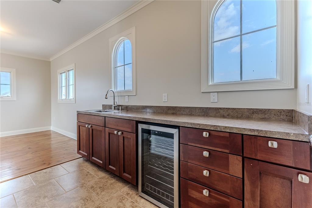 3073 Gulf Winds Circle Hernando Beach, FL 34607 - Photo 53 of 95 a kitchen with granite countertop a sink and a stove