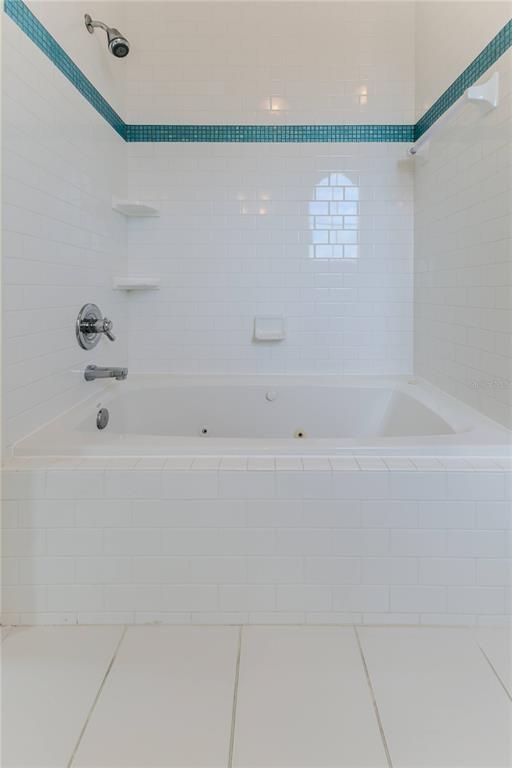 3073 Gulf Winds Circle Hernando Beach, FL 34607 - Photo 61 of 95 a bathroom with a bathtub