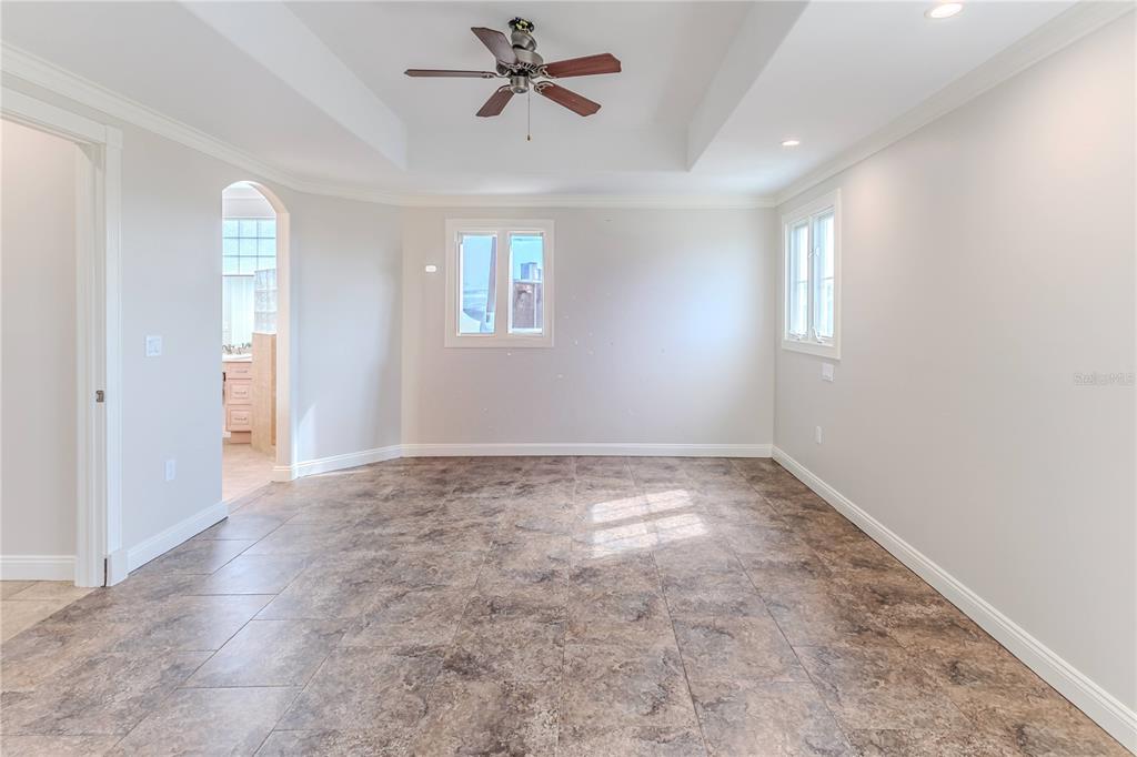 3073 Gulf Winds Circle Hernando Beach, FL 34607 - Photo 71 of 95 a view of empty room with wooden floor and window