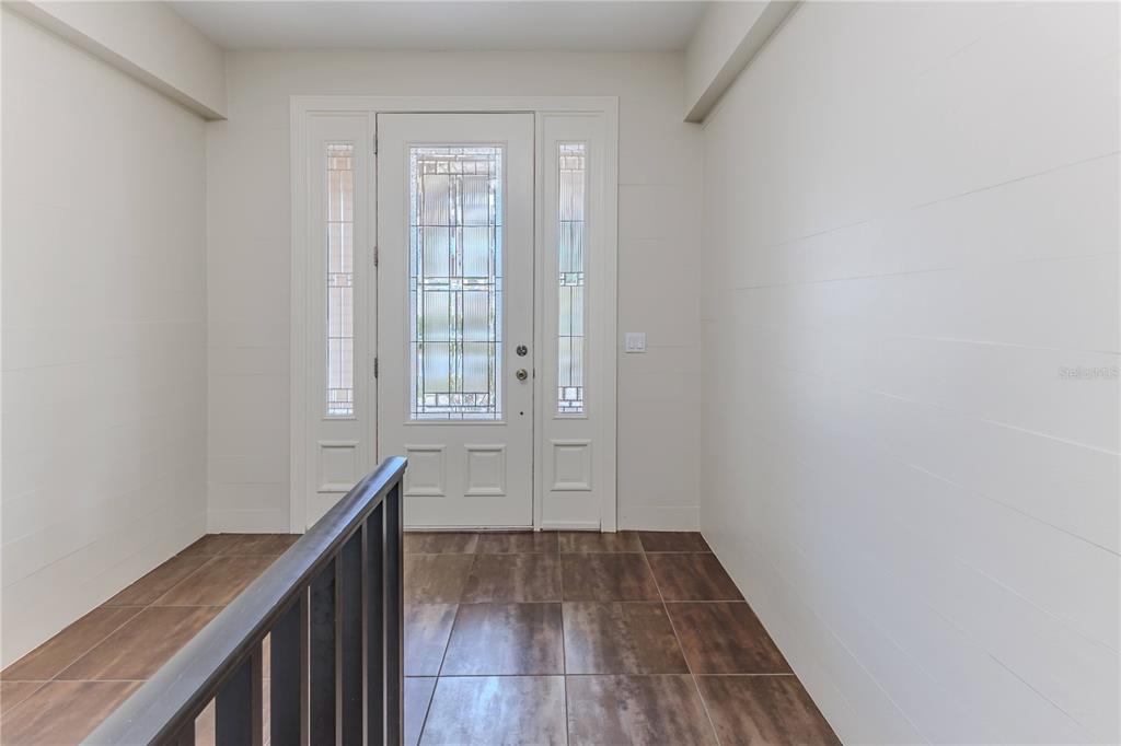3073 Gulf Winds Circle Hernando Beach, FL 34607 - Photo 8 of 95 a view of a hallway and wooden floor