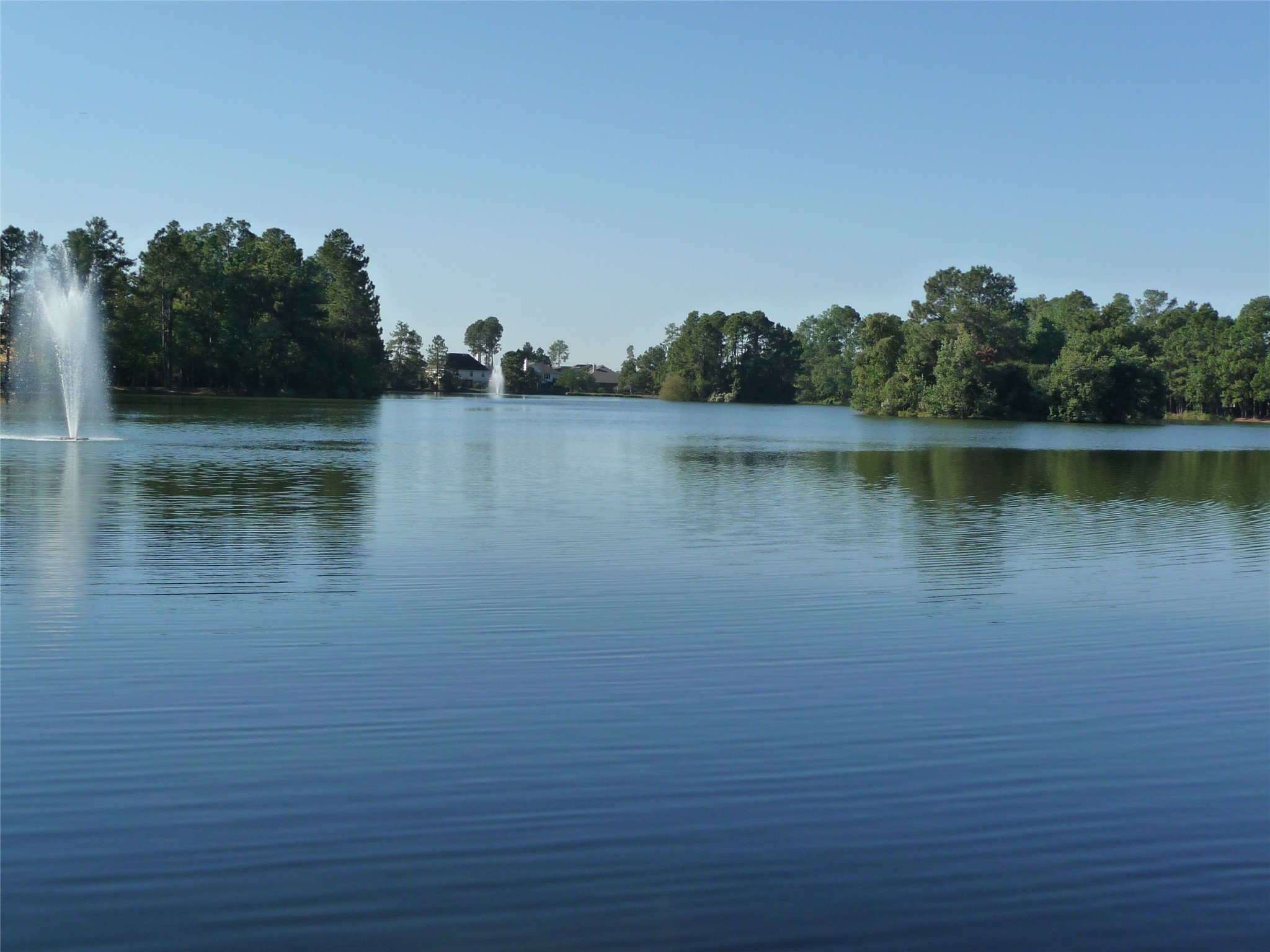20110 Stormy Pine Lane Spring, TX 77379 - Photo 41 of 44 One of the many neighborhood amenities is the 20-acre community lake surrounded by a paved walking trail with one of two community pools close by.