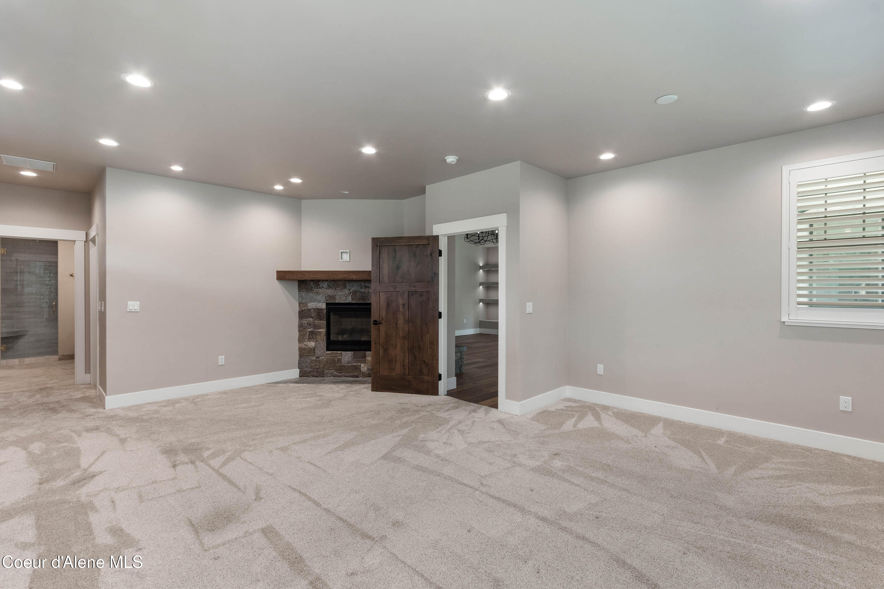 403 Slaveck Dover, ID 83825 - Photo 17 of 52 Master Bedroom to Fireplace