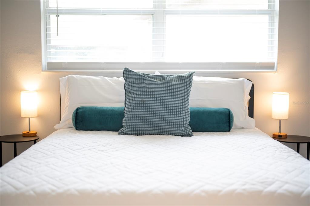 2214 Nottingham Road Lakeland, FL 33803 - Photo 28 of 40 a bedroom with a bed and window