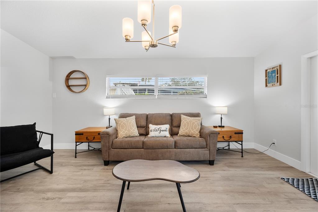 2214 Nottingham Road Lakeland, FL 33803 - Photo 4 of 40 a living room with furniture and a window