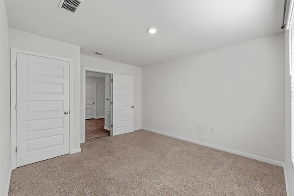 an empty room with closet