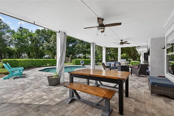 a view of a porch with a small yard
