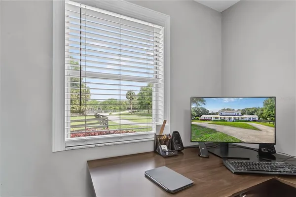 a room with furniture and a large window