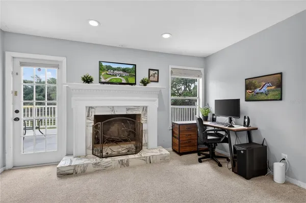 a living room with furniture and a window