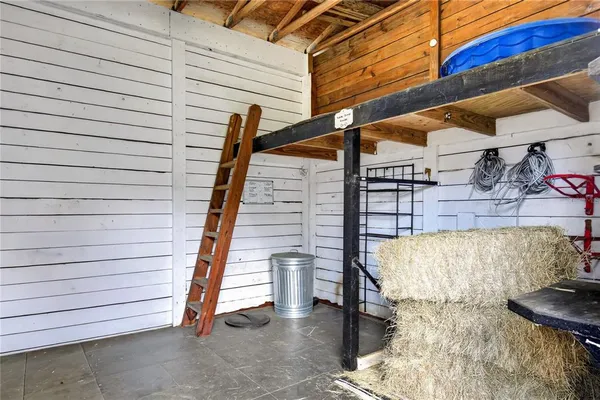 a view of a porch with wooden floor
