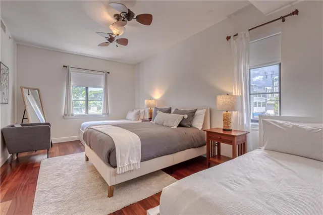 a living room with furniture or couch and a flat screen tv