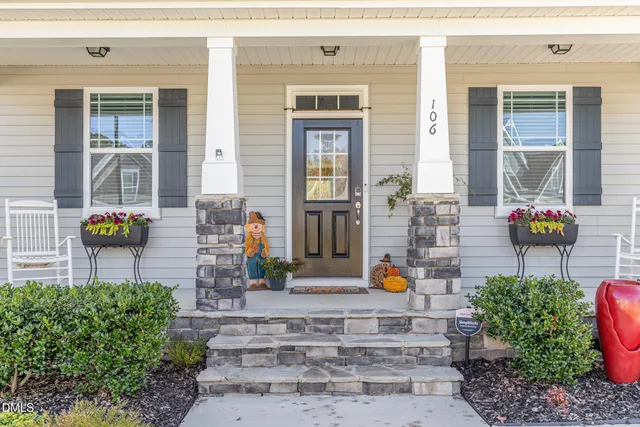 a front view of a house with outdoor space
