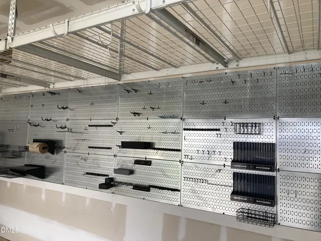 a kitchen with stainless steel appliances kitchen island granite countertop a stove and a sink