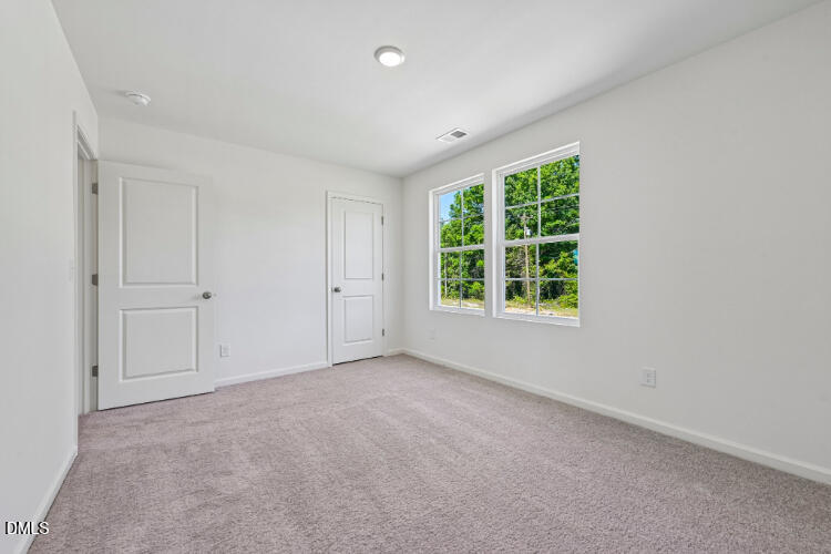 10955 Lancaster Store Road Castalia, NC 27816 - Photo 19 of 20 a view of an empty room with a window