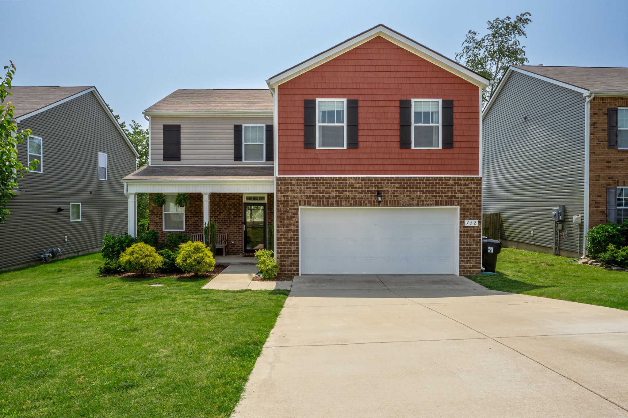 752 Prominence Road Columbia, TN 38401 - Photo 1 of 35 a front view of a house with a yard and garage