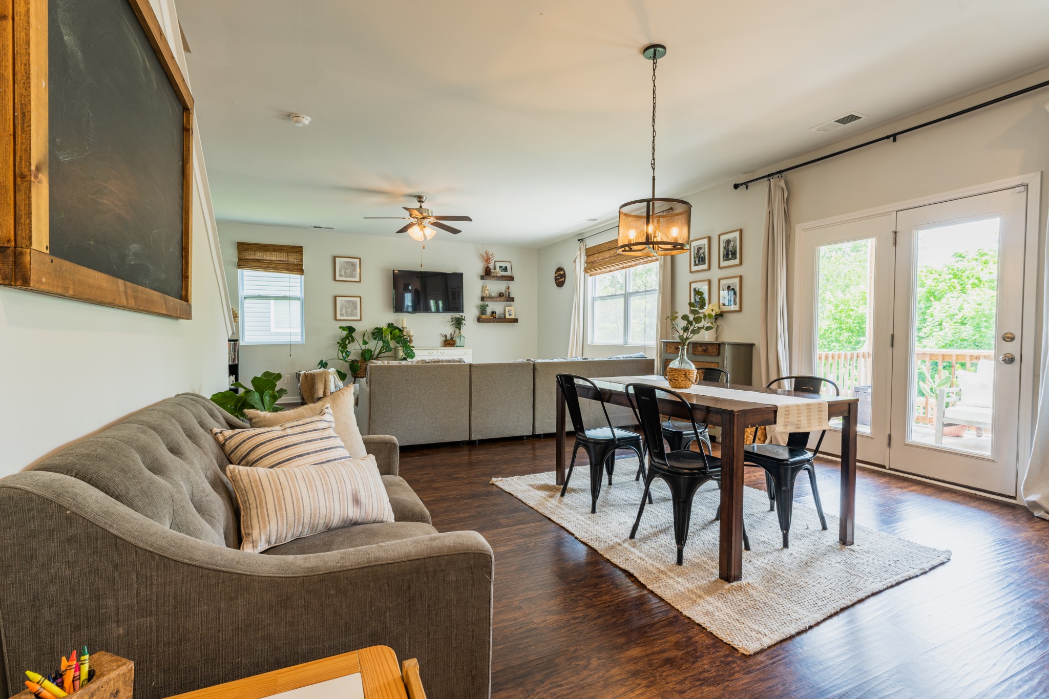 752 Prominence Road Columbia, TN 38401 - Photo 12 of 35 a living room with furniture a dining table and a floor to ceiling window