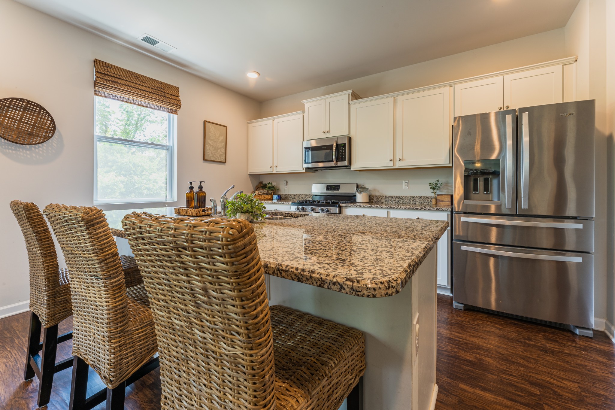752 Prominence Road Columbia, TN 38401 - Photo 13 of 35 a kitchen with stainless steel appliances granite countertop a sink refrigerator and microwave
