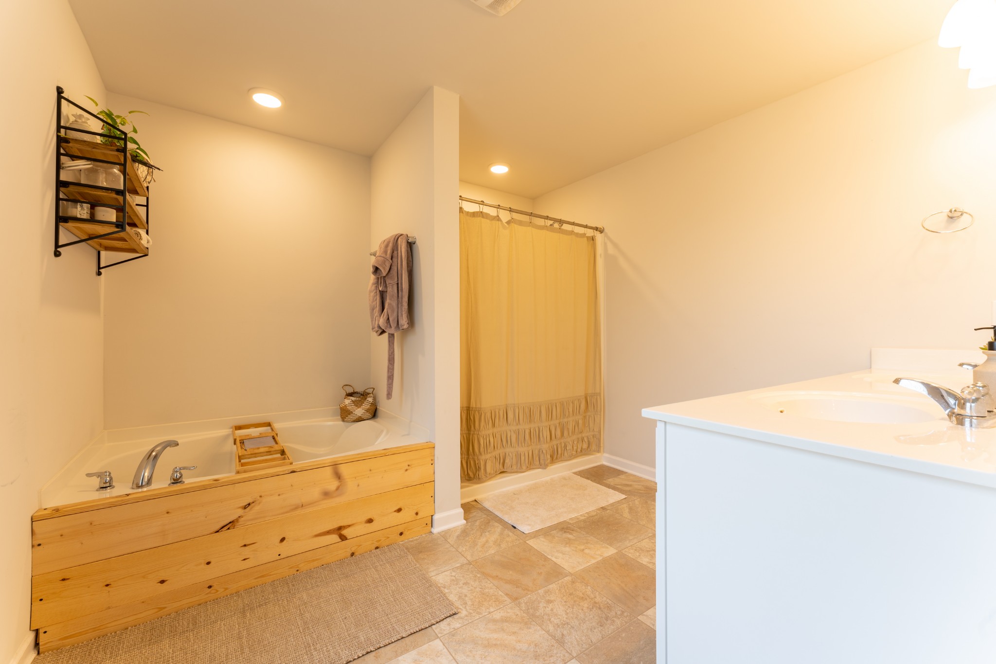 752 Prominence Road Columbia, TN 38401 - Photo 25 of 35 a bathroom with a tub sink and mirror
