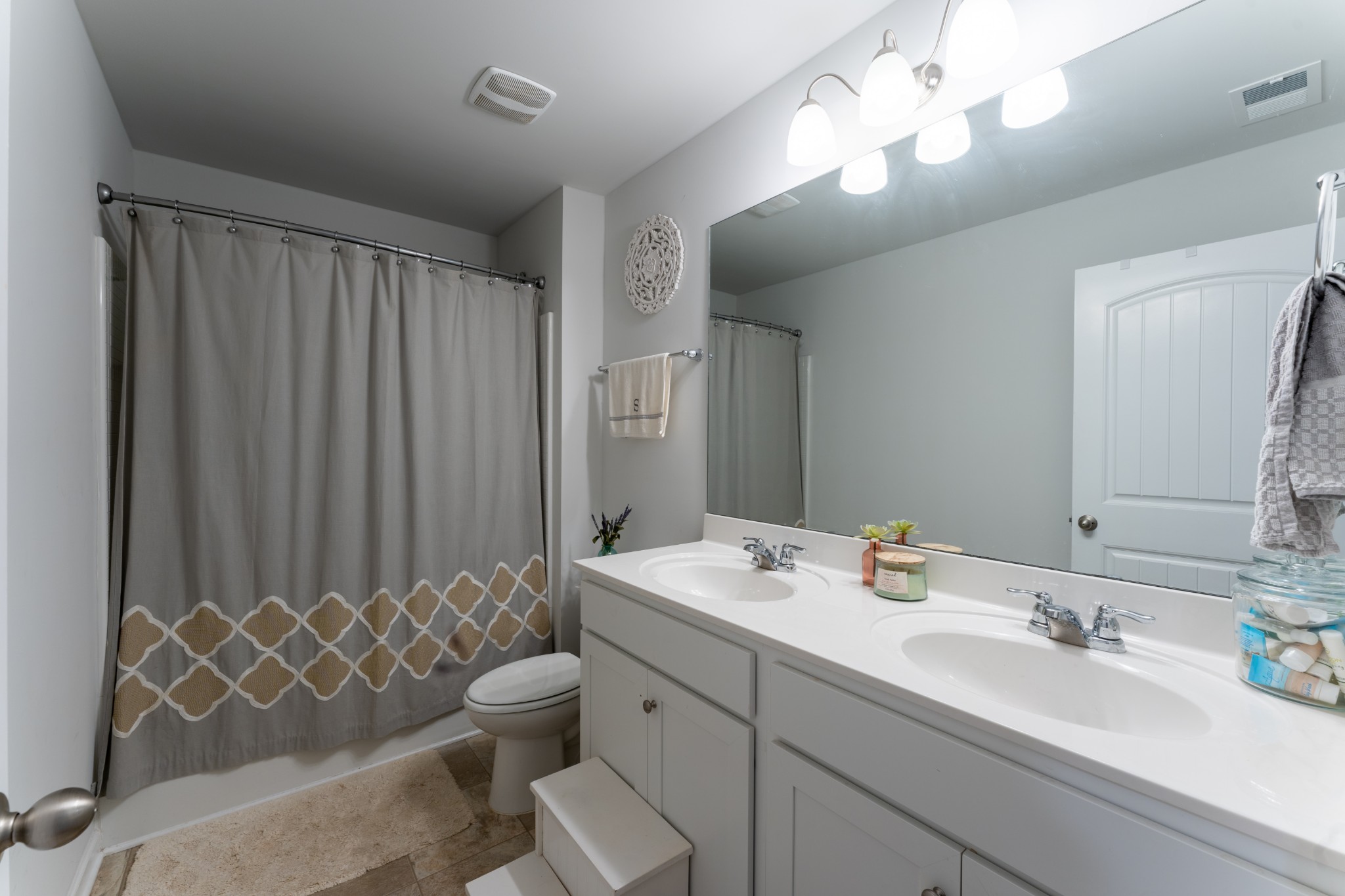752 Prominence Road Columbia, TN 38401 - Photo 30 of 35 a bathroom with a double vanity sink mirror and toilet