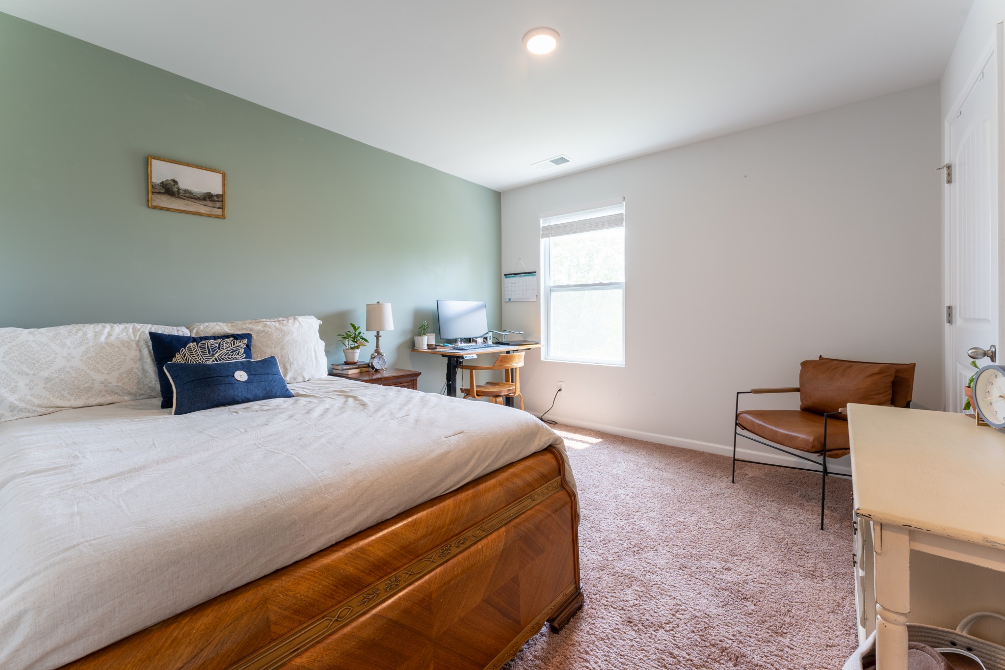 752 Prominence Road Columbia, TN 38401 - Photo 31 of 35 a bedroom with a bed and a chair in it