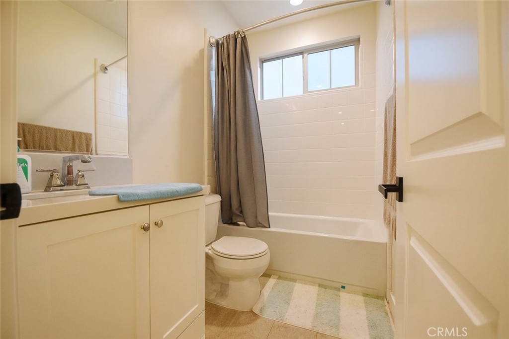 279 Barnes Road Tustin, CA 92782 - Photo 27 of 31 a bathroom with a sink a toilet and shower