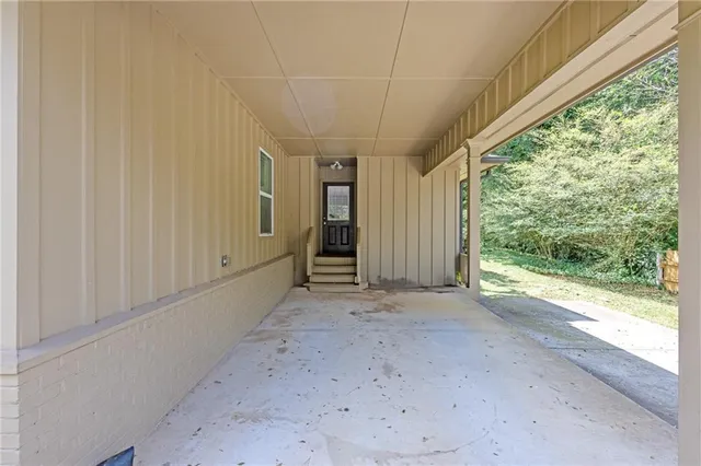 a view of a room with a large window