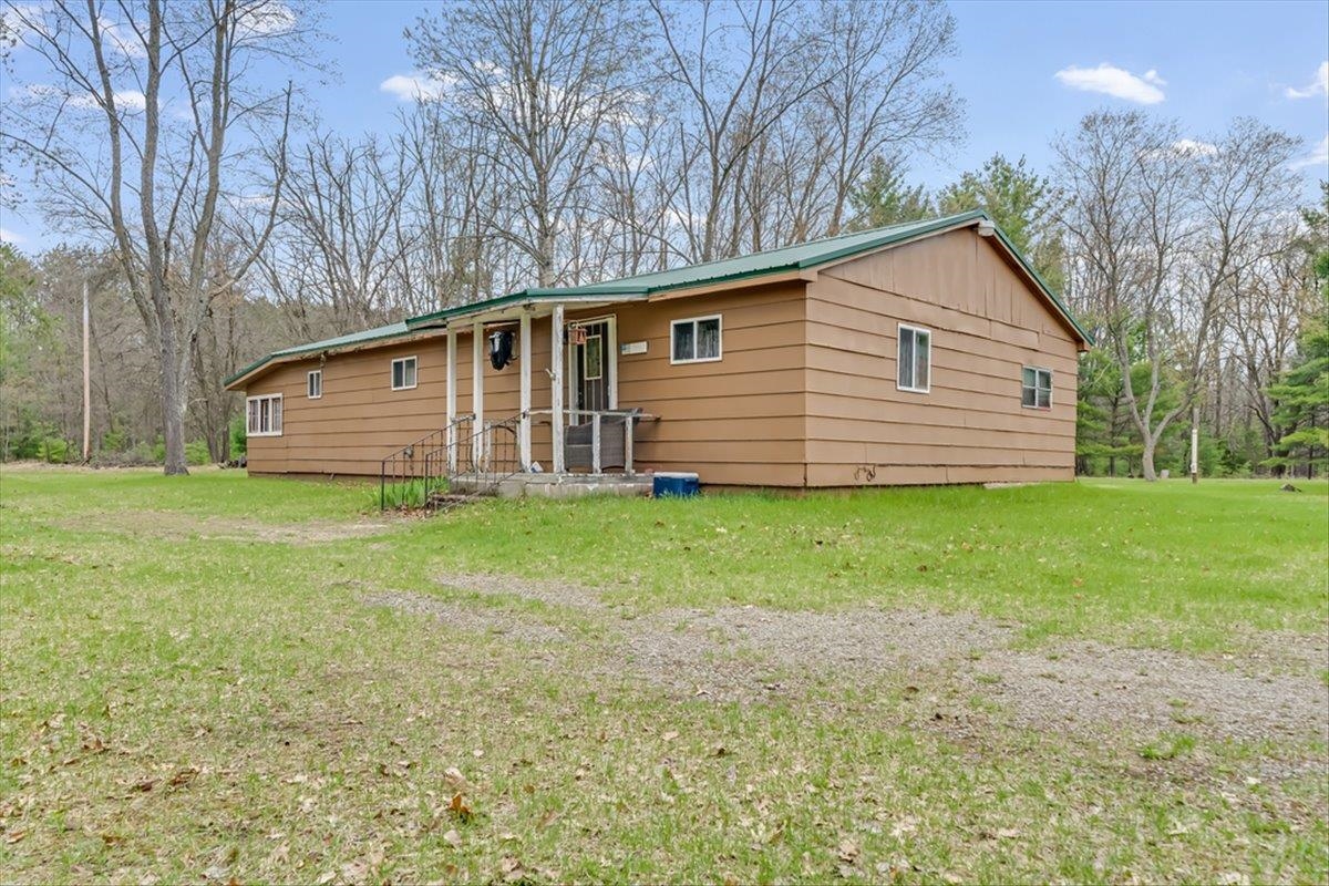 7734 West Partlo Road Whittemore, MI 48770 - Photo 1 of 45