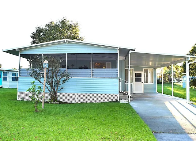 a front view of house with garden