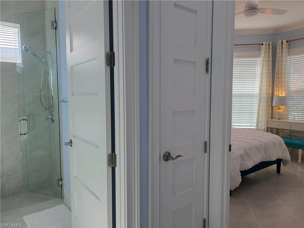 8920 Calypso Court Naples, FL 34113 - Photo 15 of 41 a view of bedroom