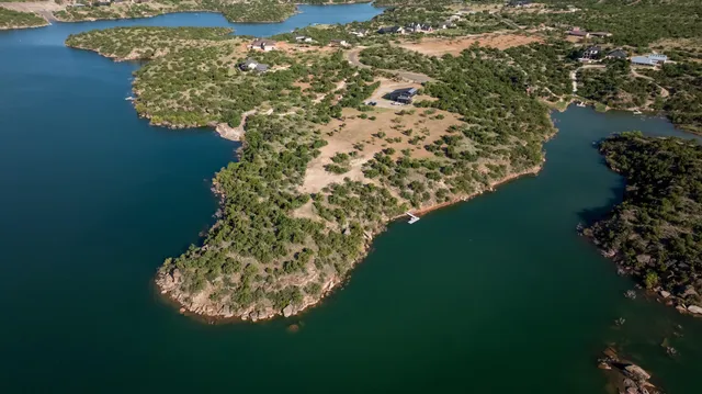 a kitchen with cabinets a sink and appliances