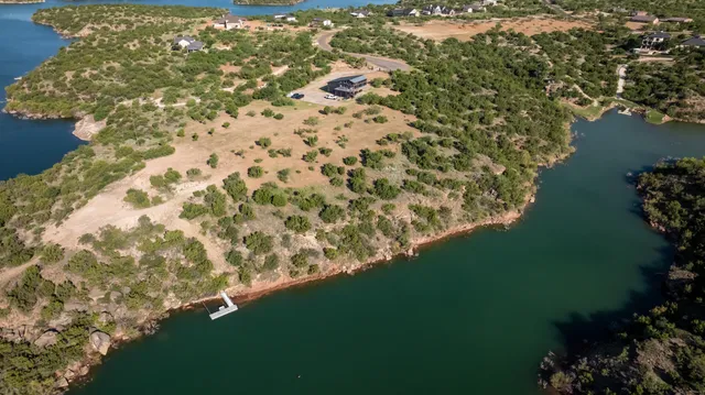 a kitchen with a stove a sink and a refrigerator