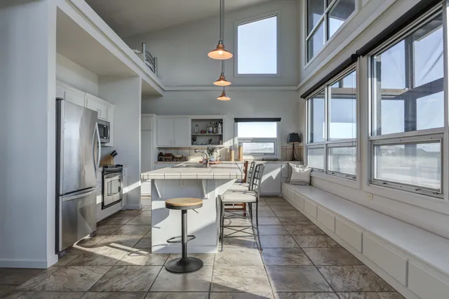 a living room with a couch and a table