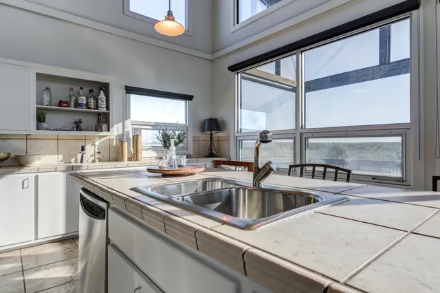 a view of living room and dining room with furniture