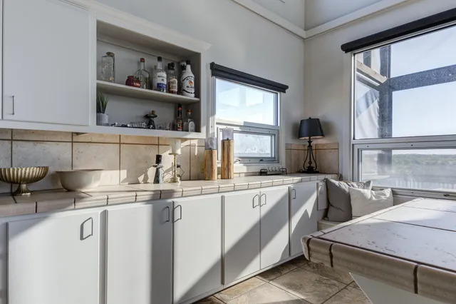 a view of storage and utility room with racks on the wall
