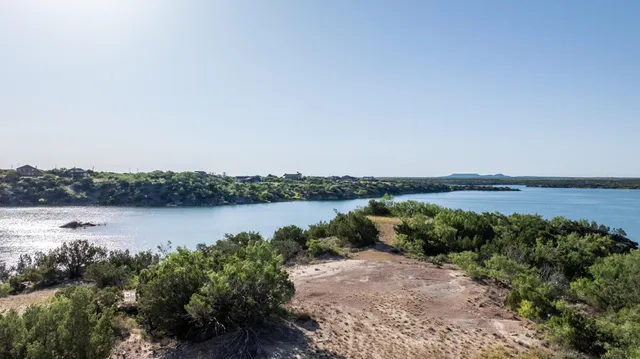 a view of a lake from a yard